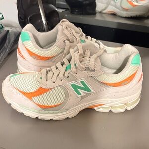 New Balance Cream and Orange Athletic Shoes